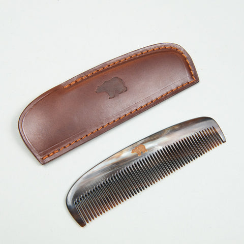 Horn comb with brown case